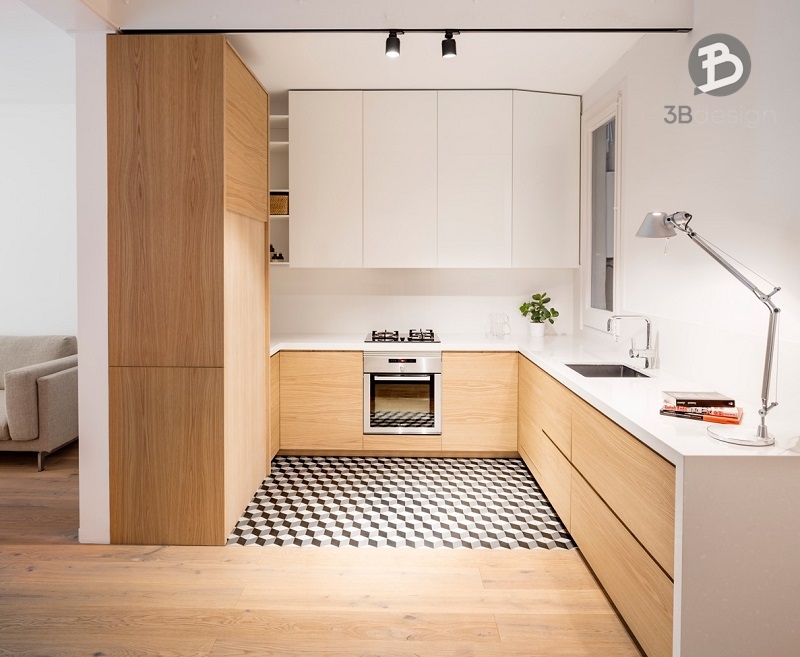 Chất liệu Melamine màu trắng và vân gỗ sáng tạo nên không gian bếp hiện đại
